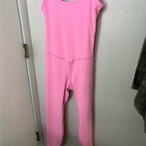 11-1. Women’s All in Motion Pink workout suit.